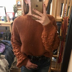 • orange sweater •